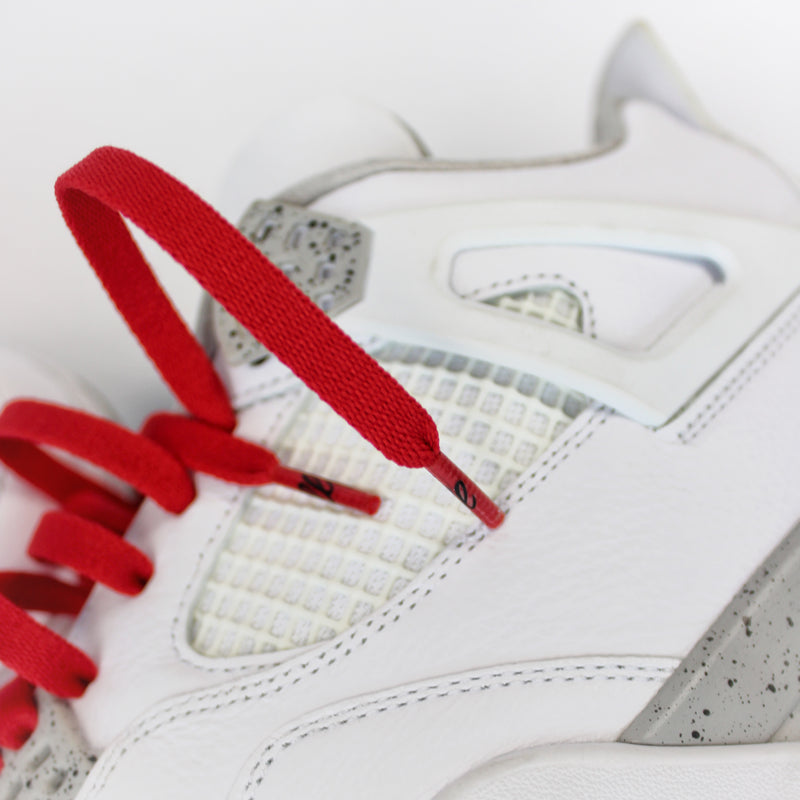 Looped Laces Chicago Red Flat Shoelaces tied in Air Jordan 4 Cement Red sneaker close up