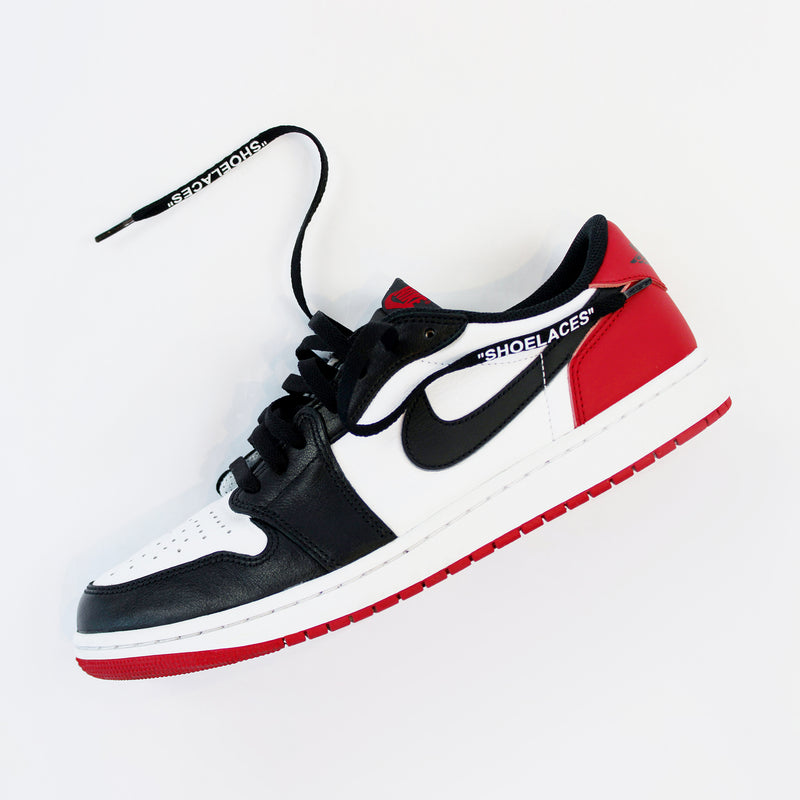 Looped Laces Black off-white style shoelaces in quotes in Air Jordan 1 Low Black Toe on white background