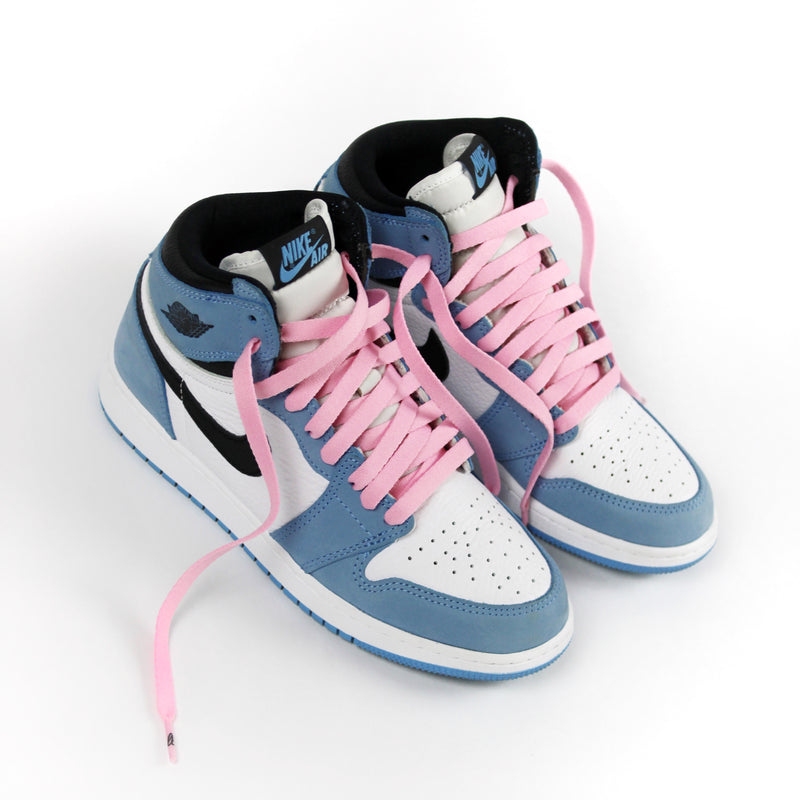 Looped Laces Cactus Pink flat shoelaces tied in Air Jordan 1 University Blue sneakers
