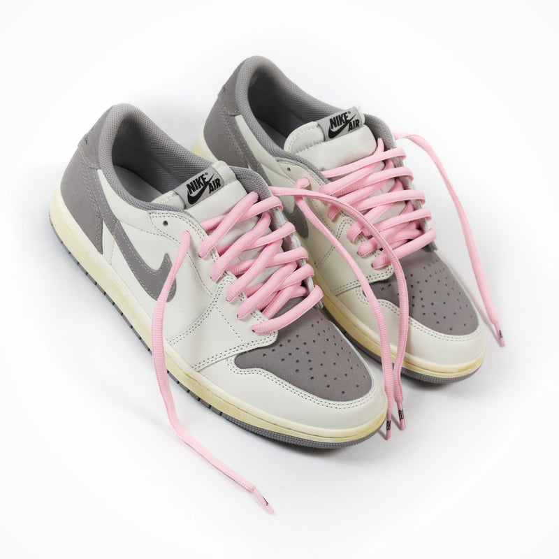 Looped Laces Cactus Pink thick oval shoelaces tied in Air Jordan 1 Low Atmosphere Grey sneakers
