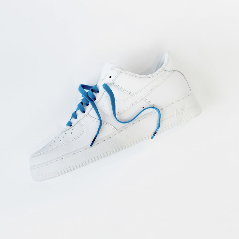 Looped Laces Cobalt Blue flat shoelaces in Nike Air Force 1 all white sneaker on white background