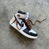 Looped Laces Dark Mocha brown flat shoelaces tied in one Air Jordan 1 High Latte sneaker slanted