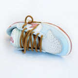 Looped Laces Light Brown rope shoelaces in Nike Dunk Fossil Rose sneaker on white background with close up on laces