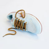 Looped Laces Light Brown thick rope shoelaces in Nike Dunk Fossil Rose sneaker on white background with close up on laces