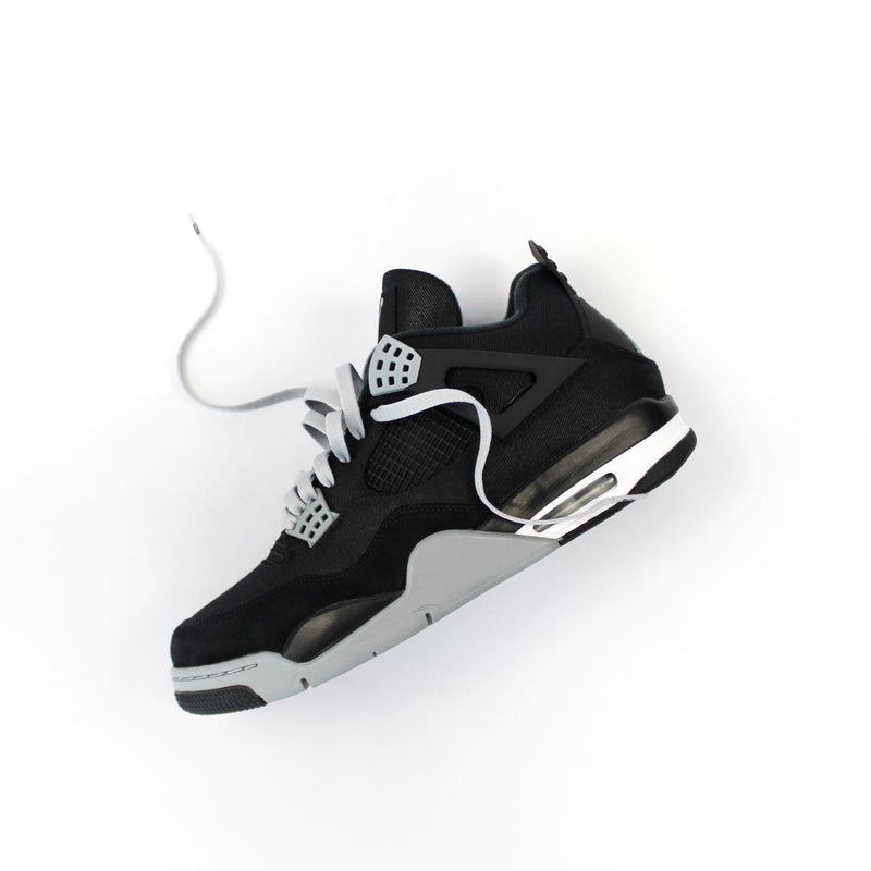 Looped Laces Light Grey flat shoelaces tied in Air Jordan 4 Black Canvas single sneaker