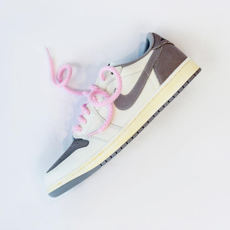 Looped Laces Light Pink Thick Rope shoelaces in Jordan 1 Low Atmosphere Grey sneaker on white background