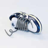 Looped Laces Medium Grey rope shoelaces in Nike Dunk Vintage Navy on white background with close up on laces