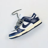 Looped Laces Medium Grey rope shoelaces in Nike Dunk Vintage Navy on white background