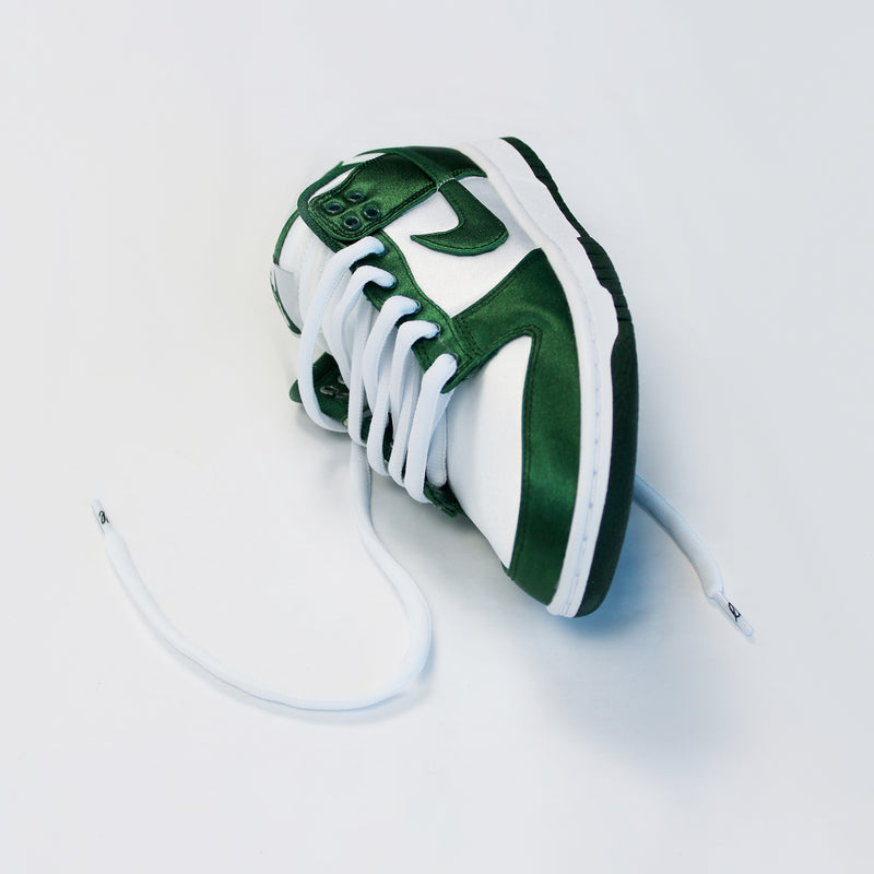 Looped Laces OG White thick oval shoelaces in Nike Dunk Satin Green on white background with close up on laces