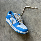 Looped Laces Oat Milk thick oval shoelaces tied in Nike Dunk Low University Blue sneakers