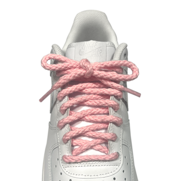 Looped Laces light pink braided rope shoelaces tied in white Nike Air Force 1 sneaker