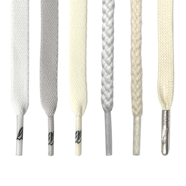 Looped Laces neutral laces bundle with the following hanging laces: flat white, flat light grey, flat dark cream, white rope, natural rope, cream waxed with metal aglet
