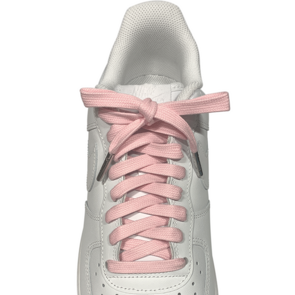 Looped Laces light pink waxed shoelaces tied in white Nike Air Force 1 sneaker