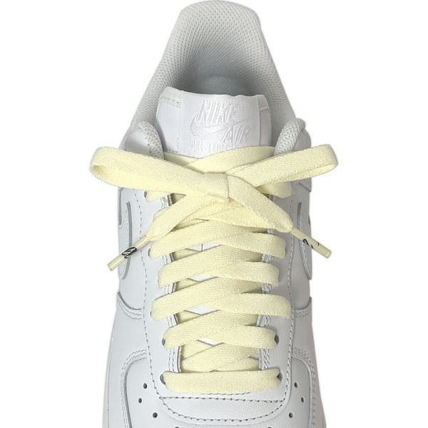 Looped Laces Pineapple Whip light pastel yellow flat shoelaces tied in white Nike Air Force 1 Low