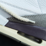 Looped Laces Classic Rope natural laces in Air Jordan 3 A Ma Maniere sneaker close up on lace tip - aglet