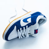 Looped Laces White thick rope shoelaces in Nike Dunk Low Dodgers sneaker with close up of front