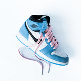 Looped Laces light pink waxed shoelaces in Air Jordan 1 High University Blue sneaker
